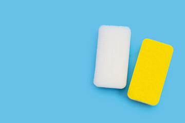 Cleaning kitchen dishwashing sponge. Copy space