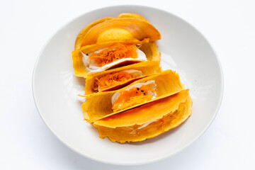 Fototapeta na wymiar Thai crispy pancakes on white background.