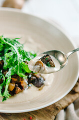 An appetizer of chestnuts, mushrooms and veal liver and chestnut velouté. A dish of Mediterranean cuisine, Corsican cuisine. Restaurant supply.