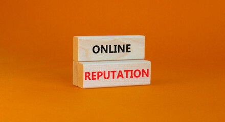 Online reputation symbol. Wooden blocks with concept words Online reputation on beautiful orange background. Business online reputation concept. Copy space.