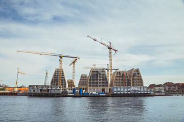 Copenhagen, Denmark, March 2022:  Construction of apartment buildings on the seashore