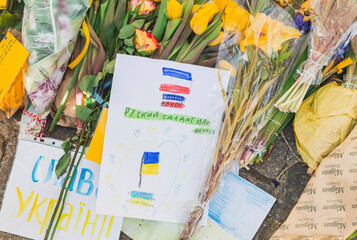 Copenhagen, Denmark, March 2022: Children's drawings and flowers near the Ukrainian embassy in Denmark