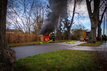 the fire department extinguishes a garden house