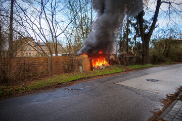 Garden shed caught fire and burns down