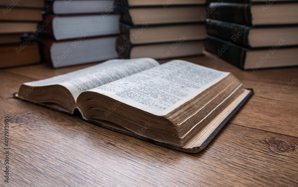 Wall mural open book on library desk