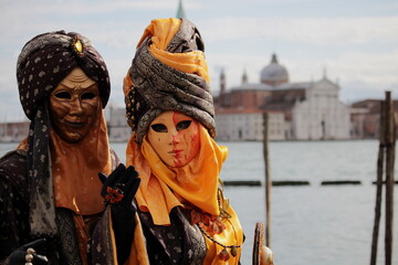 Obraz premium Colorful carnival masks at a traditional festival in Venice, Italy