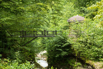 holiday house in the mountains of Chechnya in the spring among the mountains and forests near the river and lake