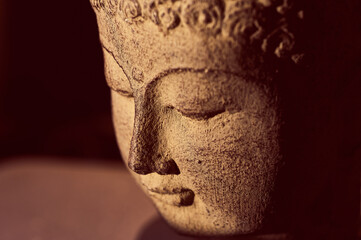 Fototapeta na wymiar Buddha head statue side view