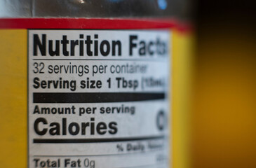 Nutrition facts label on a food product bottle