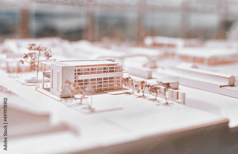 Poster the detail is mind blowing. closeup shot of an architectural model in an empty office.