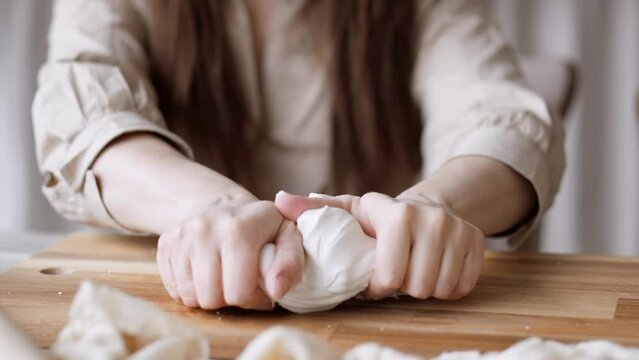 Handcraft woman master modeling cold porcelain, hands pressure dough porcelain, Girl sculpts from porcelain, hobby for the soul scandinavian and boho style interior decor