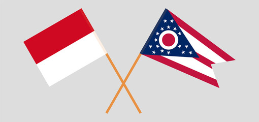 Fototapeta na wymiar Crossed flags of Monaco and the State of Ohio. Official colors. Correct proportion