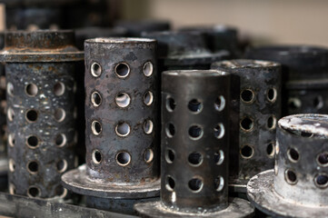 Heavy metal container on steel for jewelry casting process.
