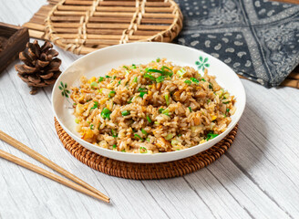 Shredded Pork Fried Rice in a dish isolated on wood table side view taiwan food
