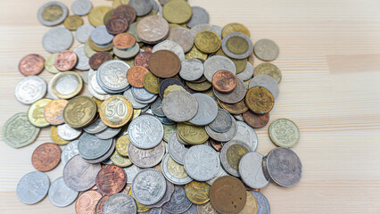 World coins piled up on the table_07