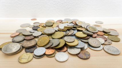 World coins piled up on the table_08
