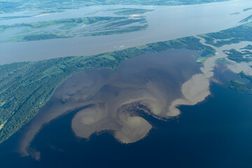 Aerial photo of the Amazon rainforest and the Amazon River basin in Brazil.