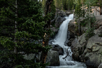 Fototapeta na wymiar Long Exposure of Alberta Falls in Rocky Mountains