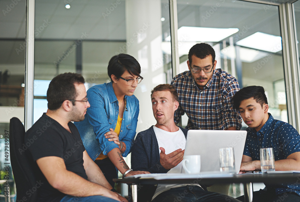 Poster so what do you guys think. shot of a group of colleagues having a meeting in the boardroom.