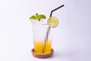 Lemon soda. Beverage for summer with brick wall background.