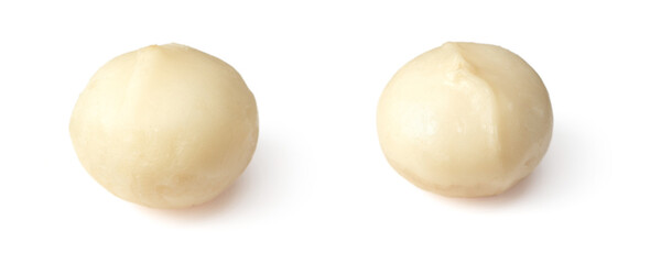 Unshelled macadamia nuts isolated on white background. - obrazy, fototapety, plakaty