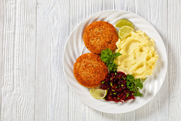 salmon patty with potato mash and beetroot salad