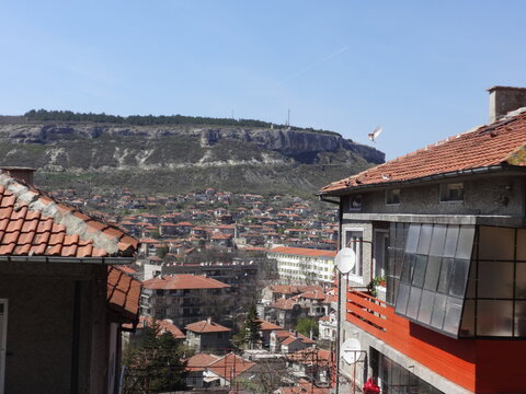 View of Ovech behind a House Roof in Provadia, Bulgaria