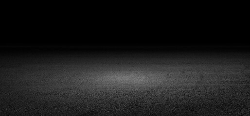 Empty asphalt road in the night or black background with floor for interior decoration or gym for exercise.