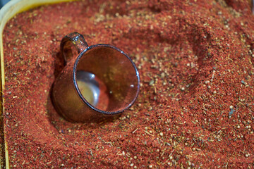Image of glass and seasoning.