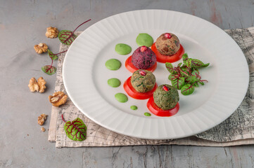 multicolored traditional georgian pkhali on gray background