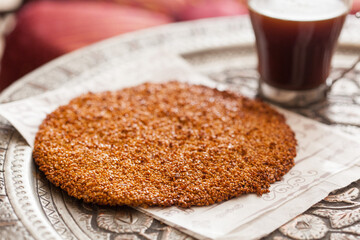 Giant grain cookie served with coffee 