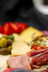 platter of fresh fruits and cheeses 