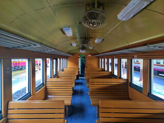 Seats on the Thai Vintage Train. Inside Retro Cabin Car at Hua Lamphong Station or Bangkok Central Railway Station. Bangkok, Thailand. March 5th, 2022.