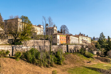 Fototapeta na wymiar View at the buildings and nature in Bergamo Alta in Italy