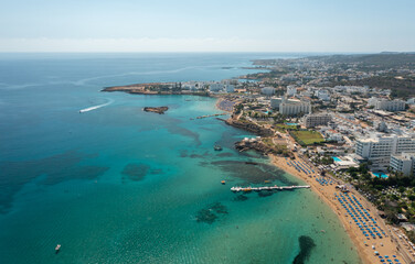 Fototapeta na wymiar Beaches and hotels of the first line of the Mediterranean Sea in Protaras, Cyprus, aerial view