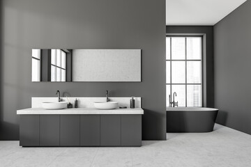 Grey bathroom interior with sink and tub near panoramic window