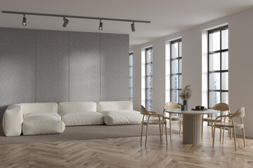 Corner view on bright living room interior with panoramic windows