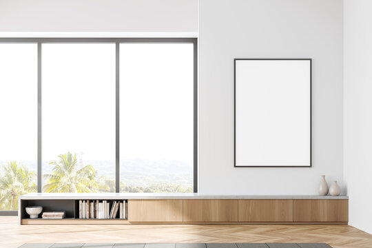 Light art room interior with wooden drawer, window and mockup frame