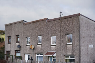 Derelict council house in poor housing estate slum with many social welfare issues