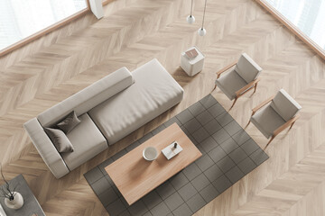 Top view of living room interior with couch and chairs, coffee table