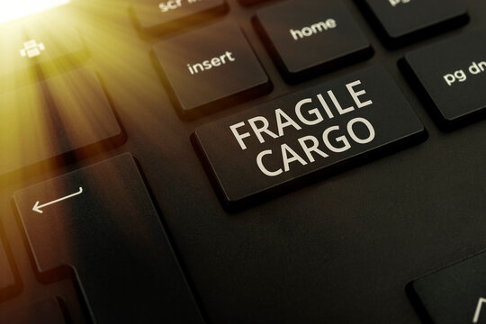 Handwriting Text Fragile Cargo. Business Overview Breakable Handle With Care Bubble Wrap Glass Hazardous Goods Computer Keyboard And Symbol.Information Medium For Communication.