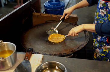 Roti on flying pan in the street food