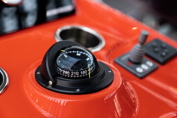 Close-up of the compass of a modern yacht