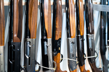 Close-up of guns in a row