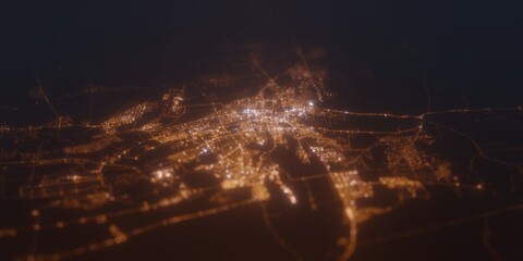 Street lights map of Al Ain (UAE) with tilt-shift effect, view from south. Imitation of macro shot with blurred background. 3d render, selective focus