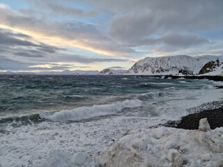 view of the coast of the sea closeup with strong violent waves