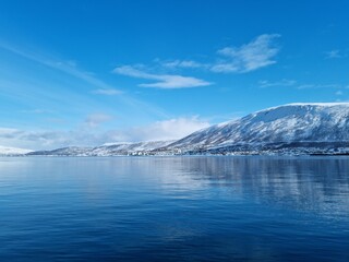 landscape photo of the Tromsdalen side, taken from the tromsoe city island side