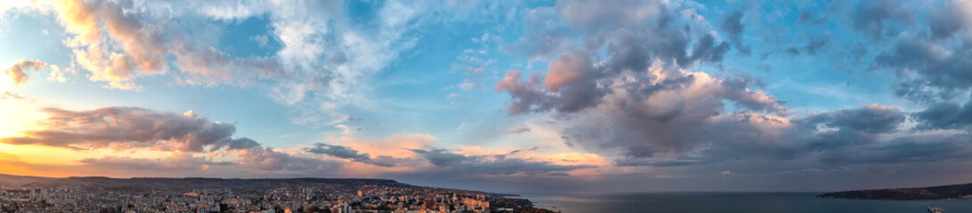Panoramic view of amazing sunset sky over the city