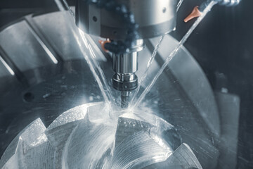 Metalworking CNC milling machine. Cutting metal modern processing technology.