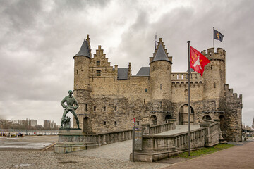 Fototapeta na wymiar An old historic castle by the river in Antwerp